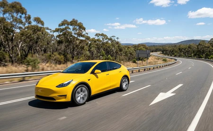 Electric vehicle driving on highway in Western Australia near Perth