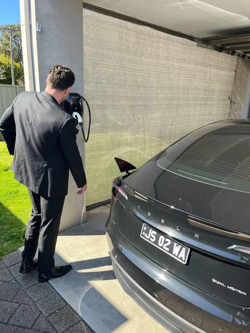 Tesla Model 3 owner at the Ocular charger we installed on his carport pillar in Morley, Perth